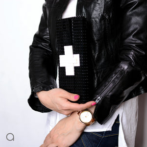 Black clutch with white cross