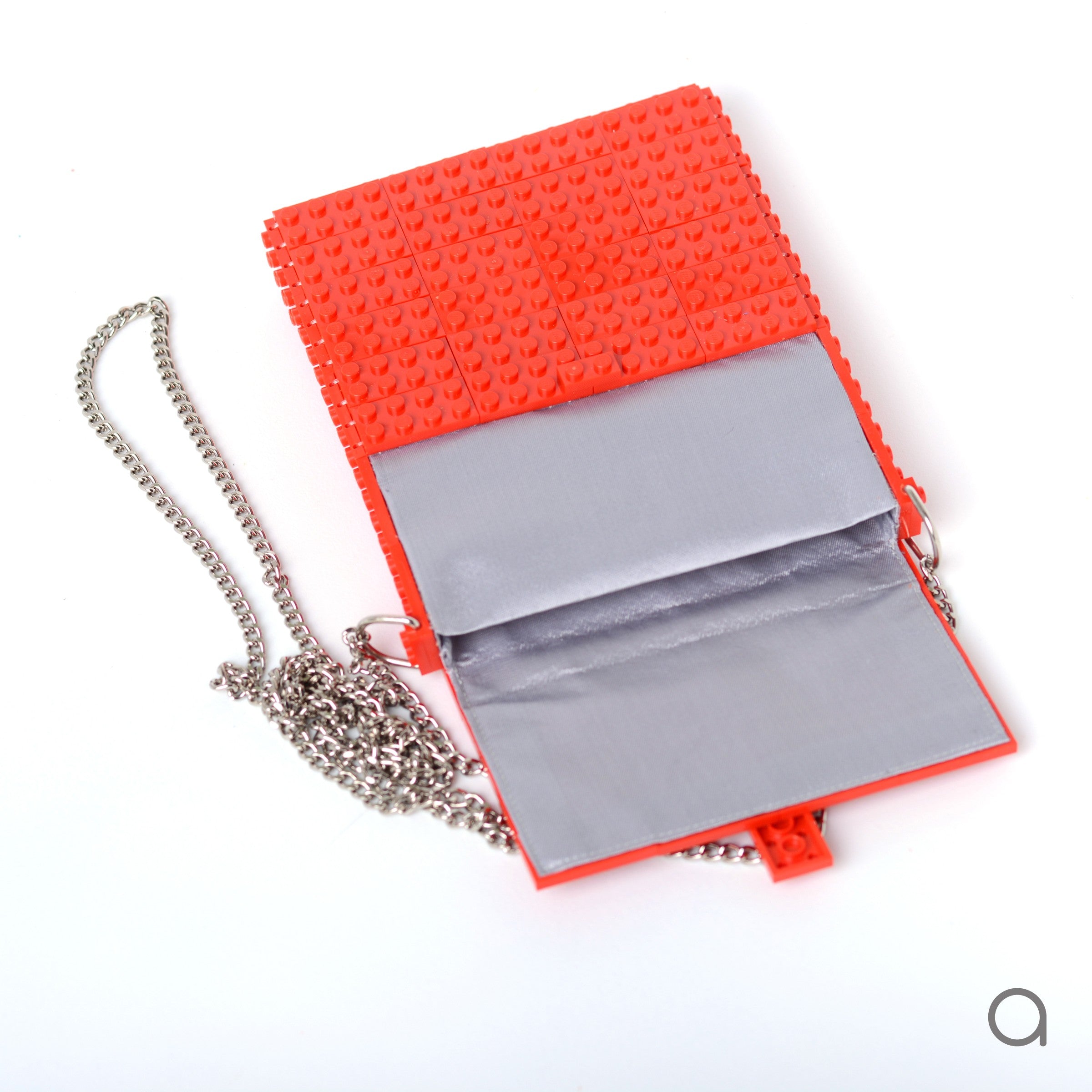Red hip clutch on a chain