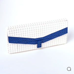 White clutch with dark blue chevron