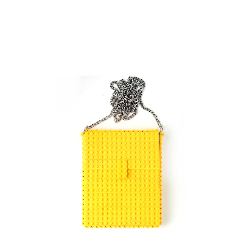 Yellow hip clutch on a chain
