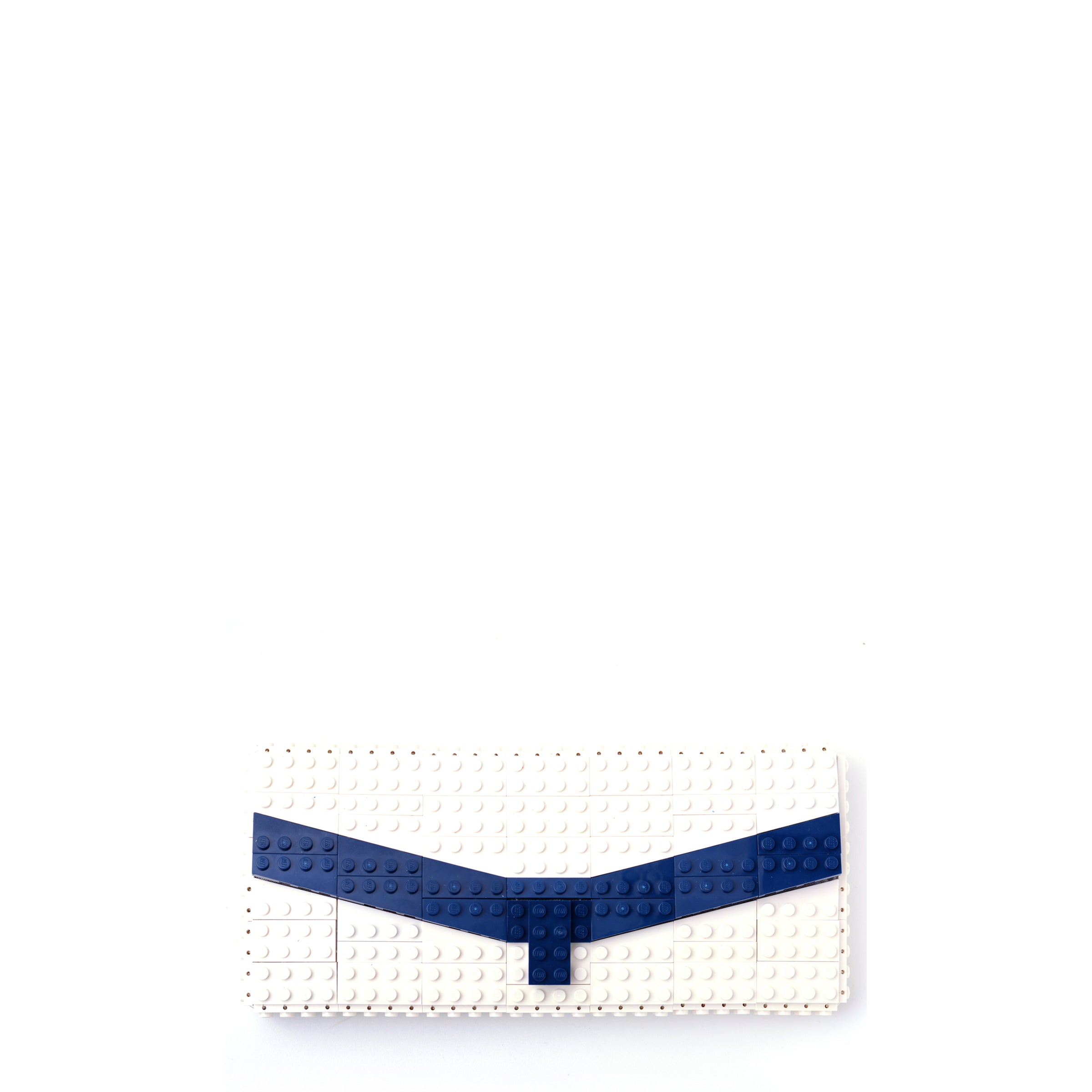 White clutch with dark blue chevron