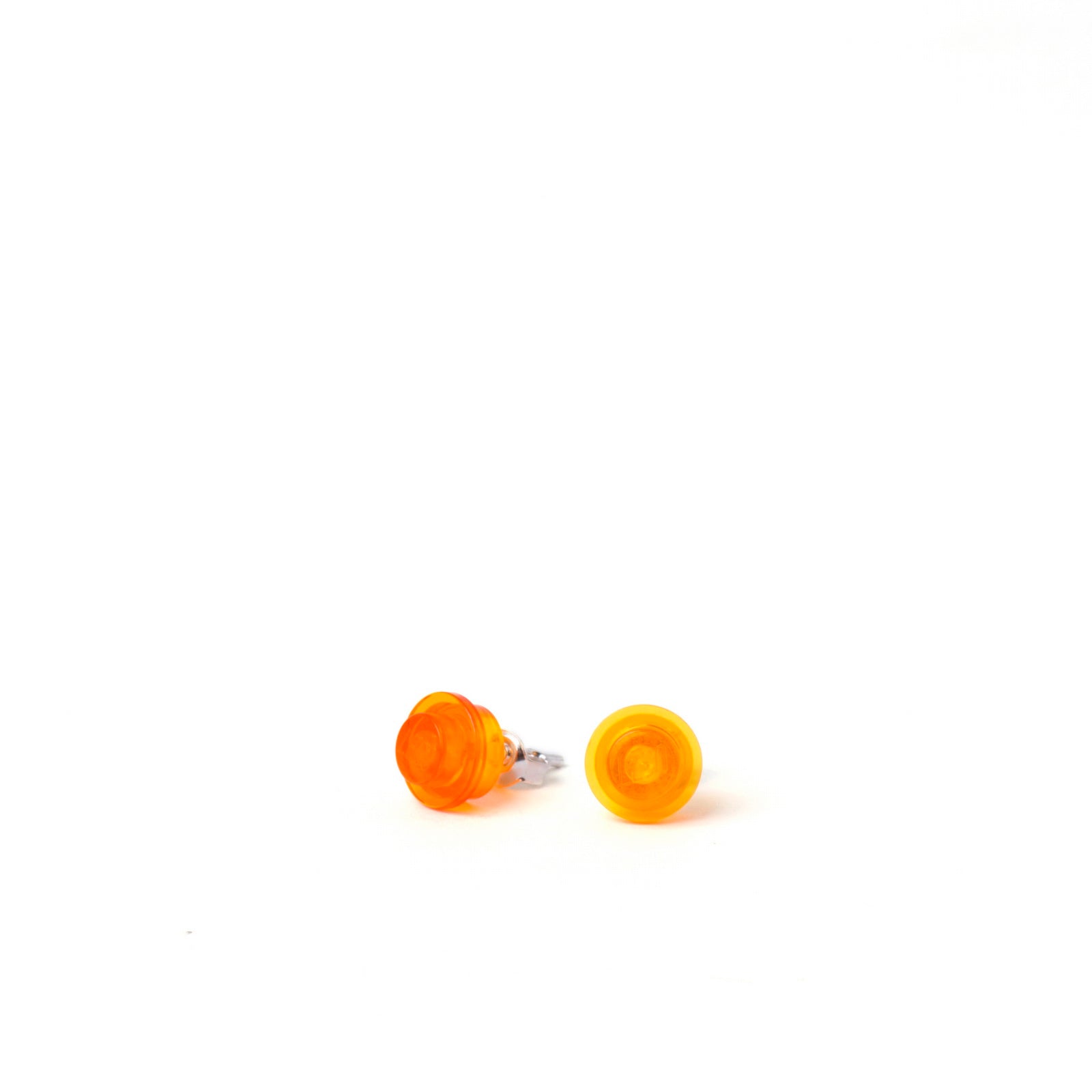 transparent orange small round studs