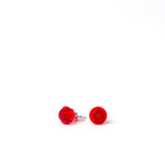 transparent red small round studs